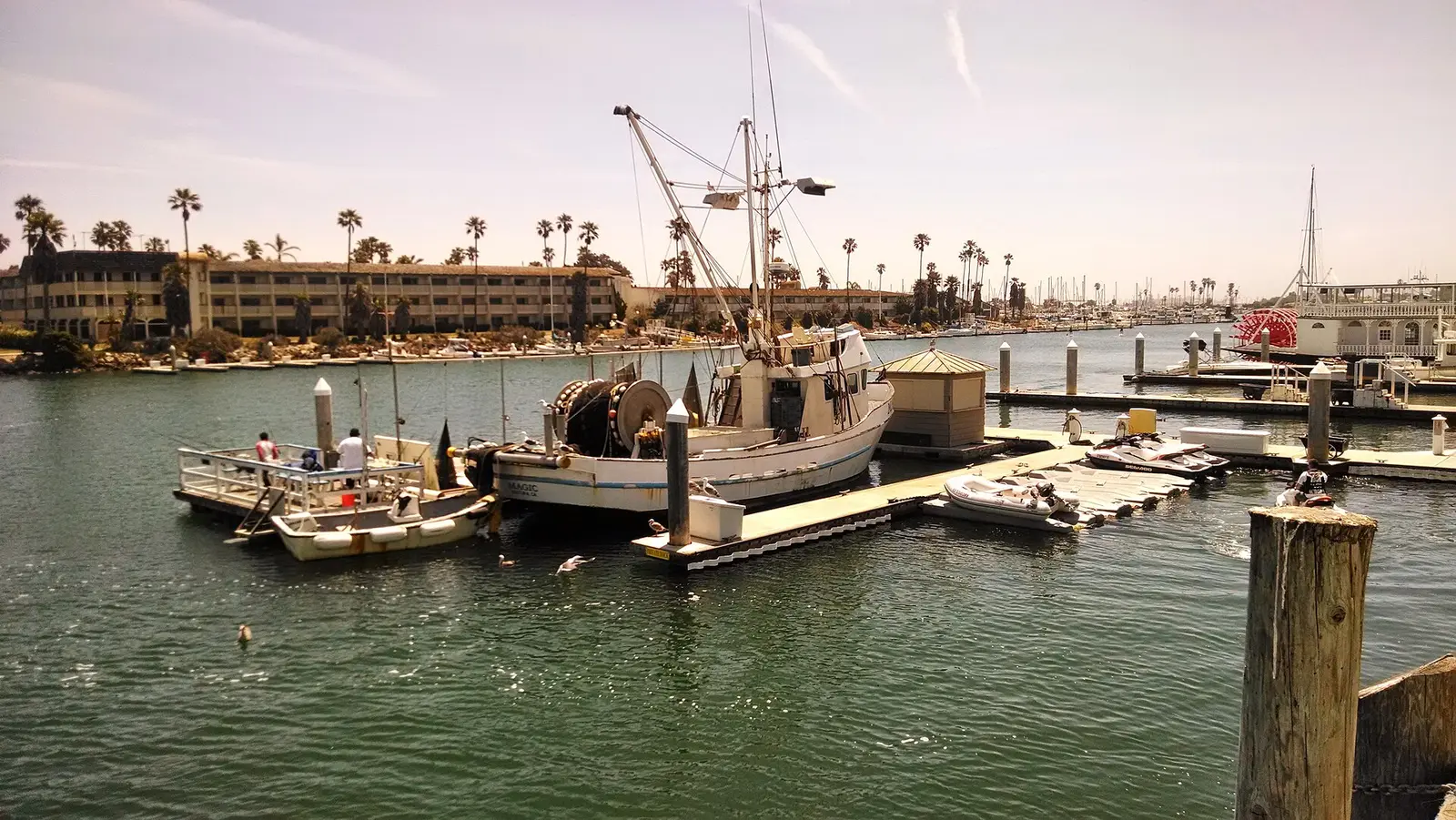 Channel Islands Beach, California — Fishing boat taken from commercial fishing boat unloading pier facing southeast with hotel in background