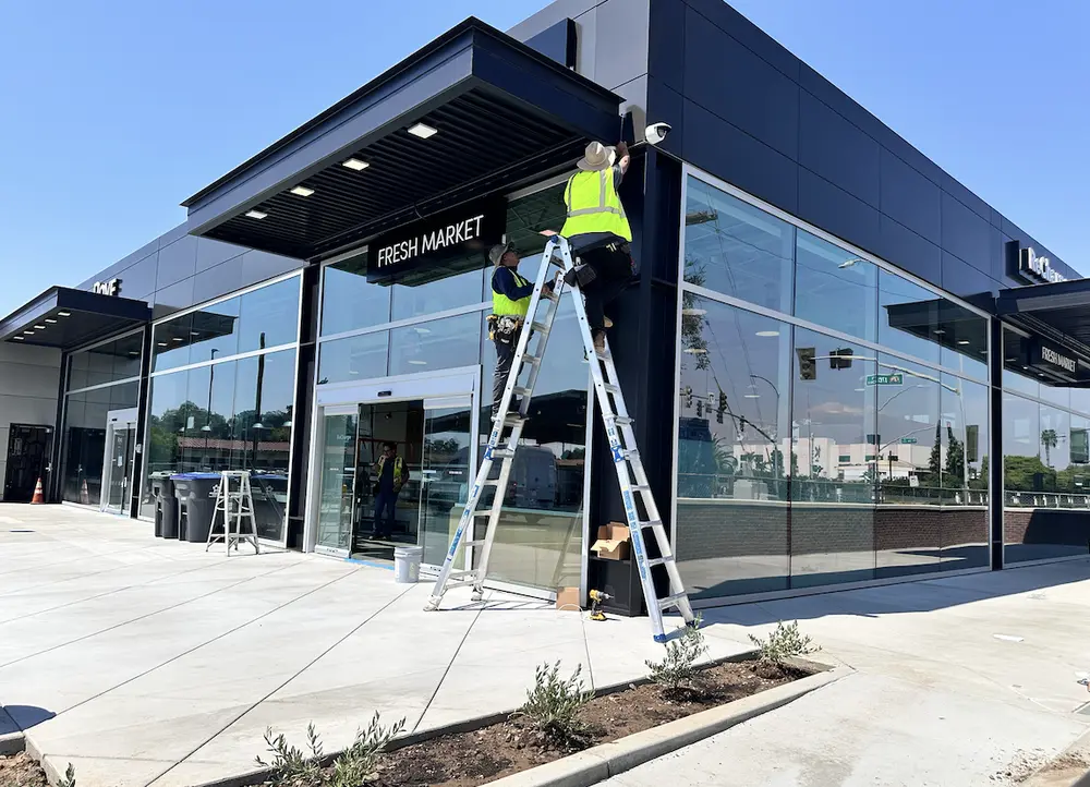 Active retail exterior camera installation — Three Factor Security fieldwork in Santa Ana