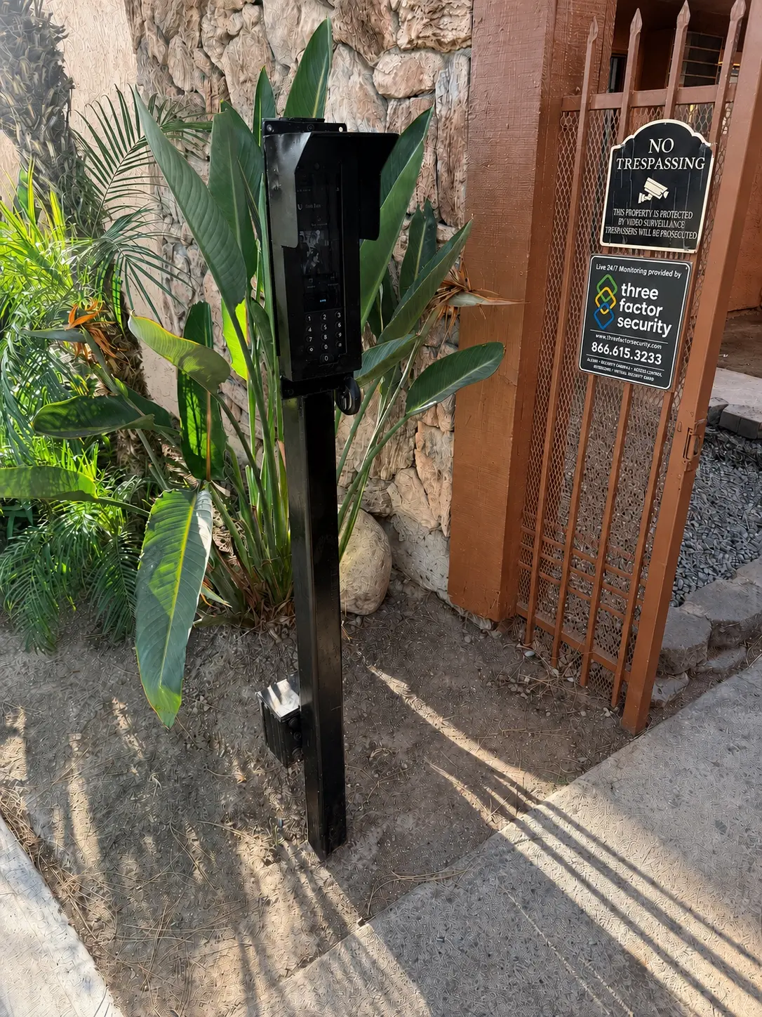 Pedestrian gate video intercom installed by Three Factor Security beside a controlled entry — Three Factor Security fieldwork in Los Angeles