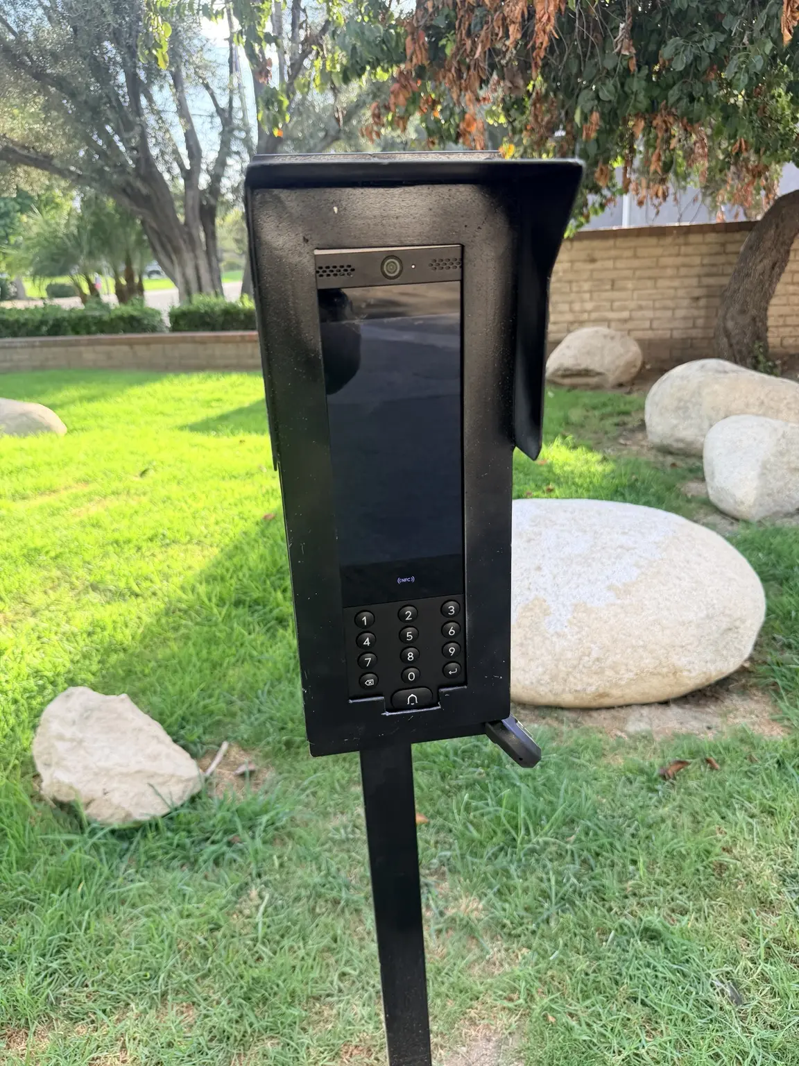 Close view of a vehicle gate video intercom and keypad station installed by Three Factor Security — Three Factor Security fieldwork in Los Angeles